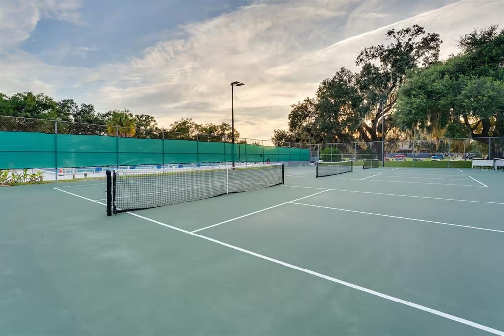 6355 Northwest 106th Place Alachua, FL 32615 - Photo 10 of 11 a view of a tennis court