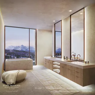 a large bedroom with a large bed and a balcony view