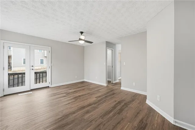 a view of a livingroom with wooden floor