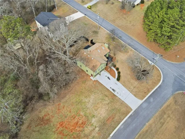 a picture of a bathroom with a shower