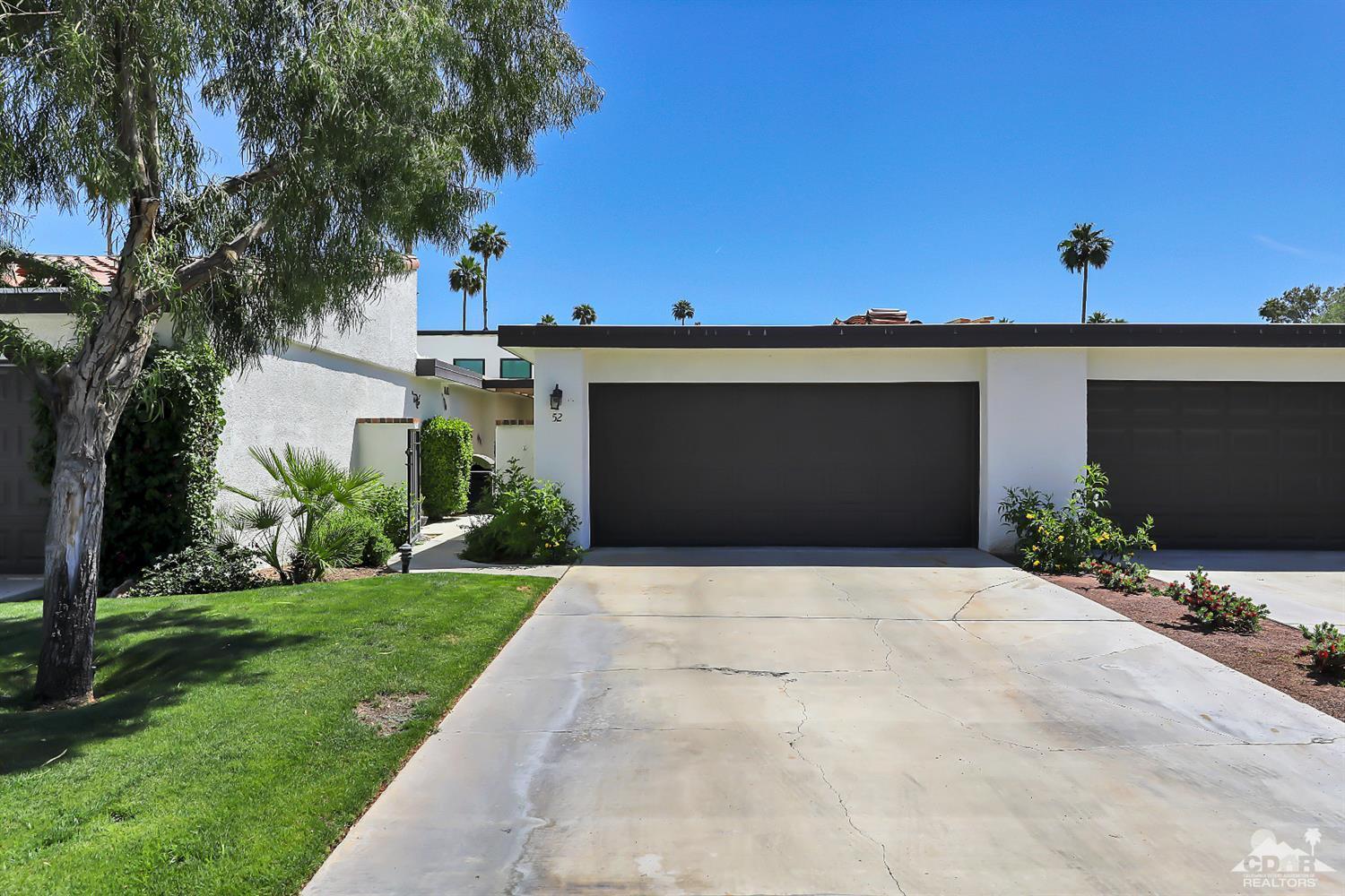52 Durango Circle Rancho Mirage, CA 92270 - Photo 17 of 20 a front view of house with a yard