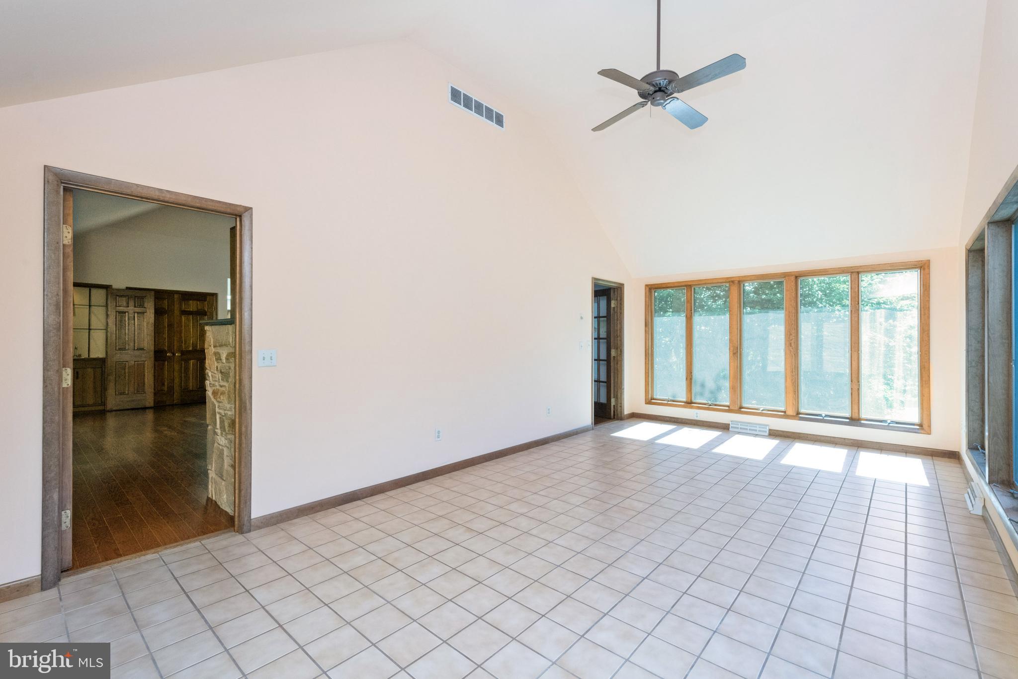 13806 Cripplegate Road Phoenix, MD 21131 - Photo 15 of 63 Sun Room w/ 3 walls of windows