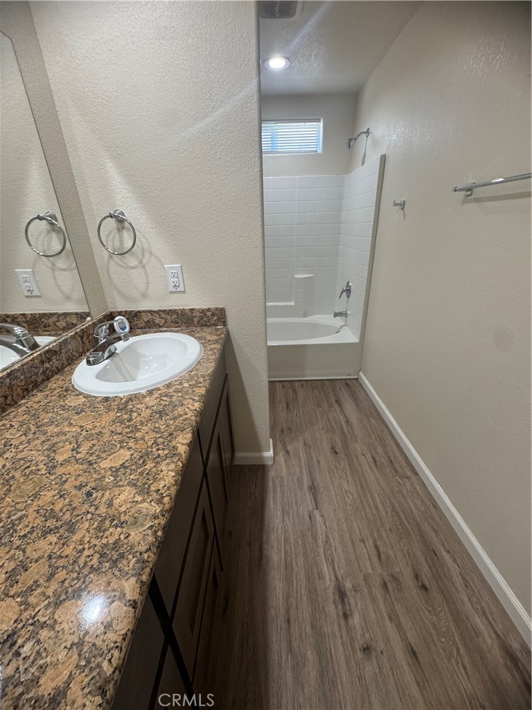 1339 Playa Del Rey Drive Merced, CA 95348 - Photo 27 of 48 a bathroom with a granite countertop sink toilet and shower