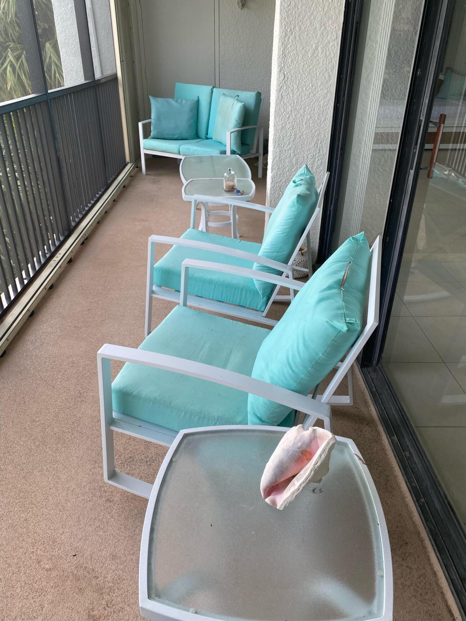 1605 Highway 1, Unit 401M3 Jupiter, FL 33477 - Photo 13 of 28 a living room with furniture