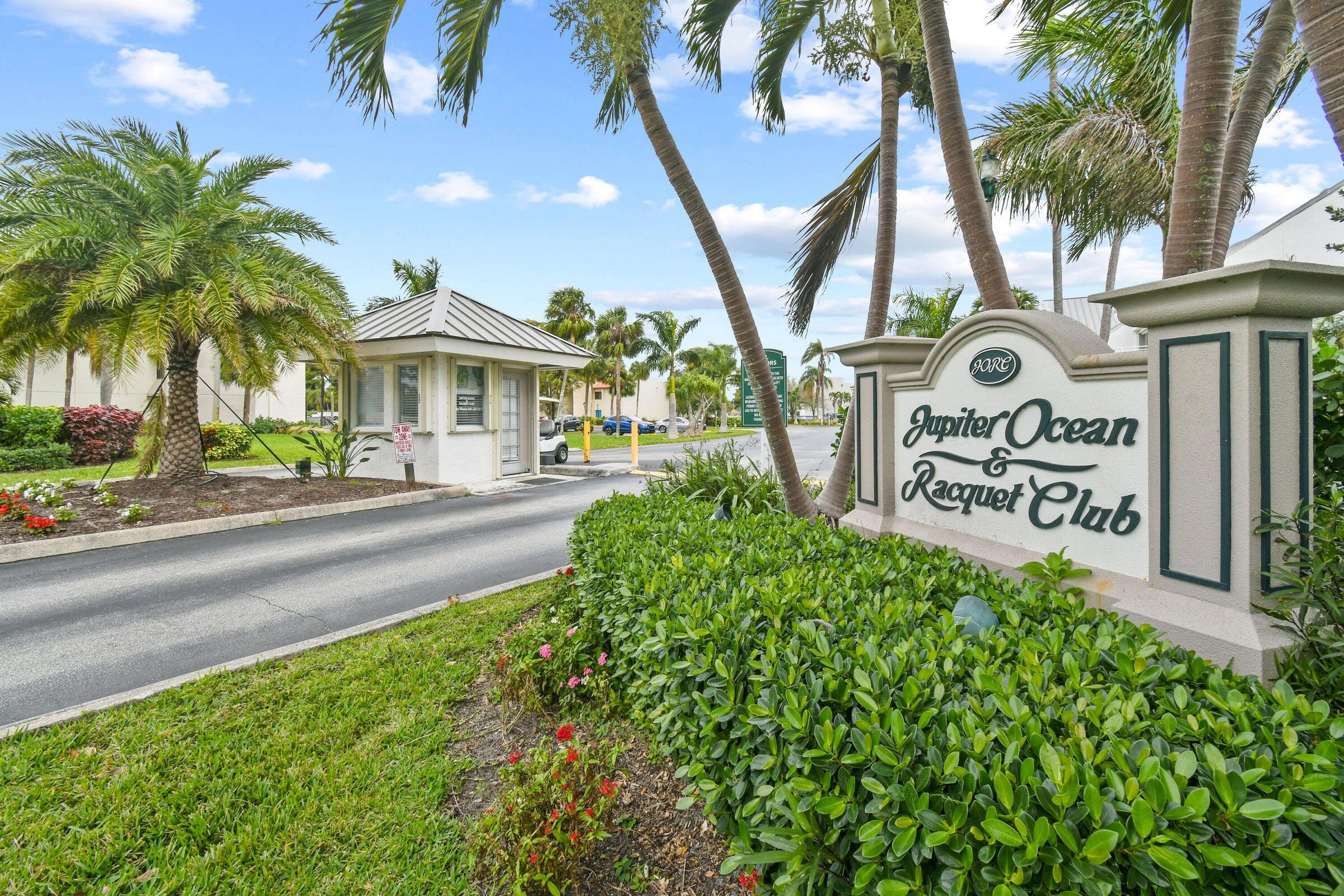 1605 Highway 1, Unit 401M3 Jupiter, FL 33477 - Photo 18 of 28 a view of a street with a building and a street sign