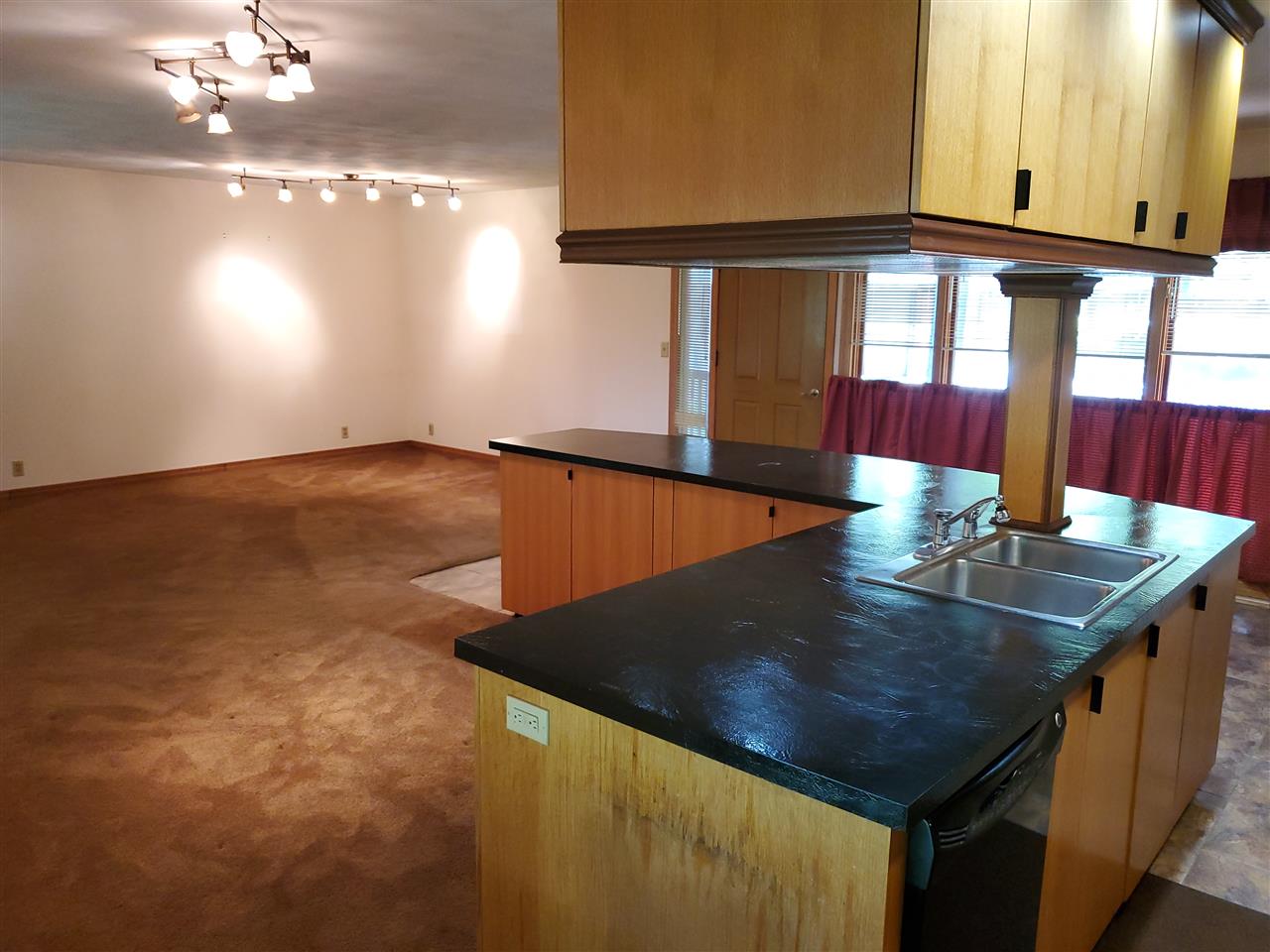 3514 North River Road Oregon, IL 61061 - Photo 12 of 25 a view of a living room and kitchen