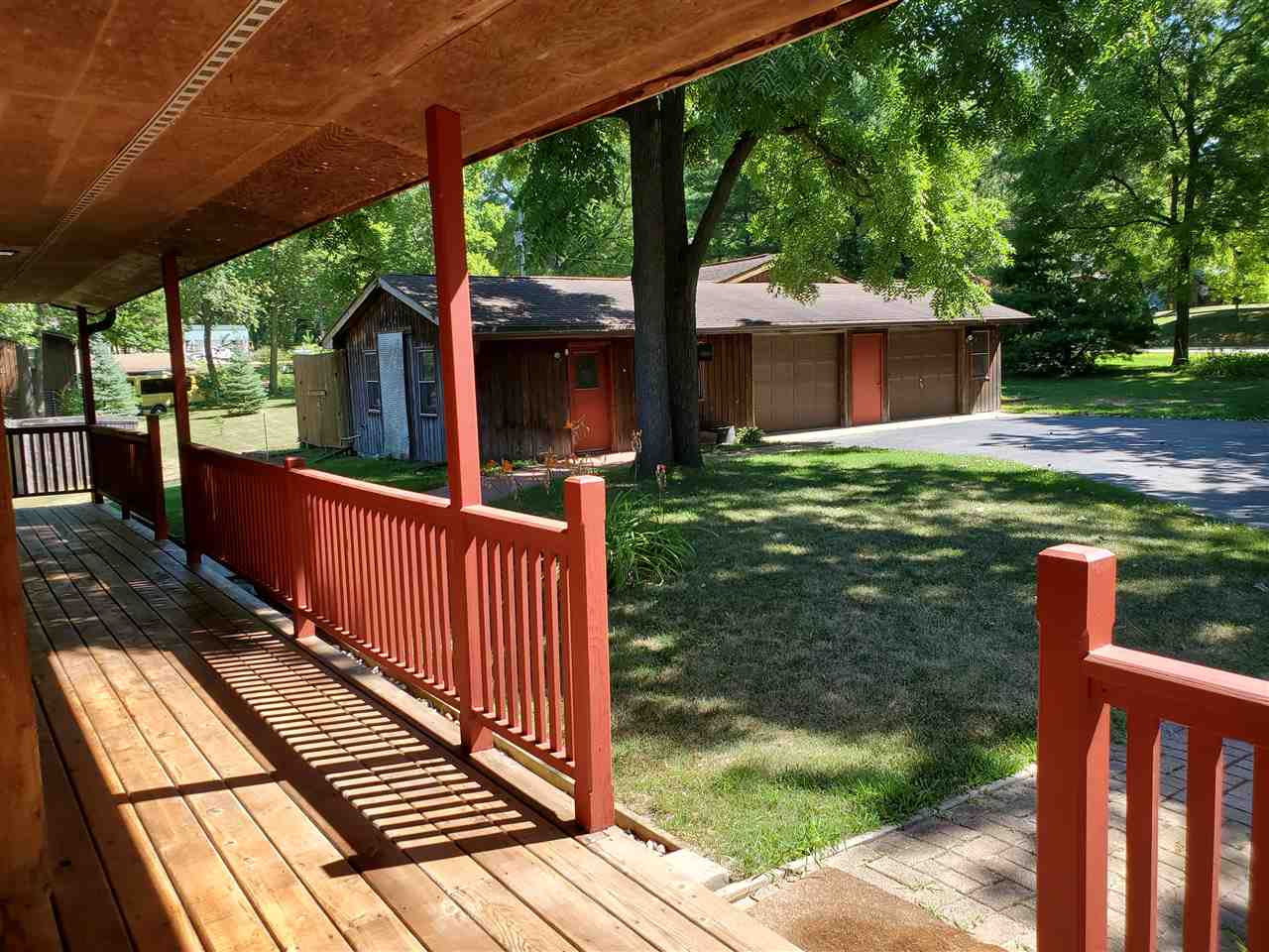 3514 North River Road Oregon, IL 61061 - Photo 24 of 25 a view of backyard with a deck and a garden