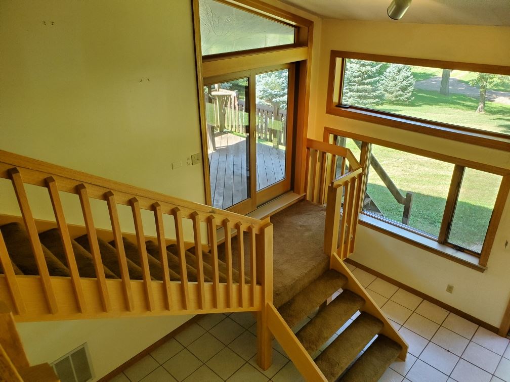 3514 North River Road Oregon, IL 61061 - Photo 5 of 25 a view of an empty room with a window