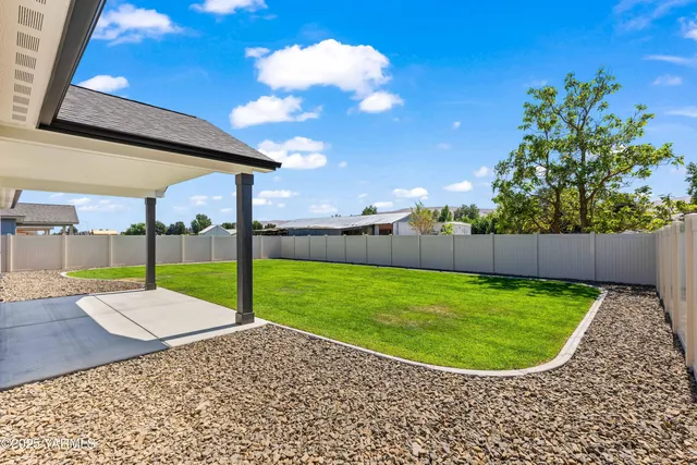 a view of a backyard with a garden