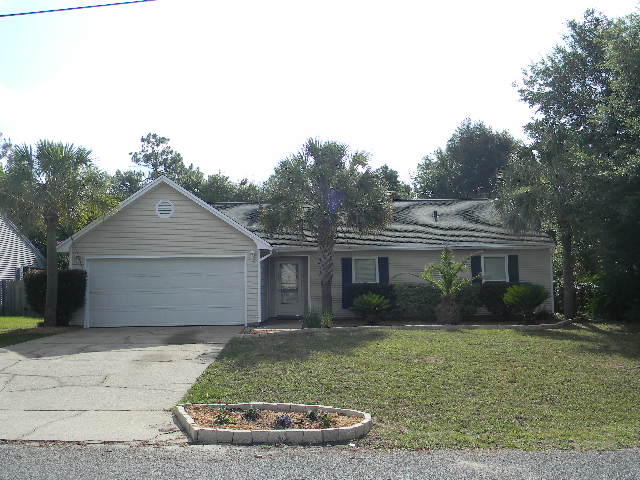 2844 Old Mill Way Crestview, FL 32539 - Photo 1 of 49 front view of house with a yard