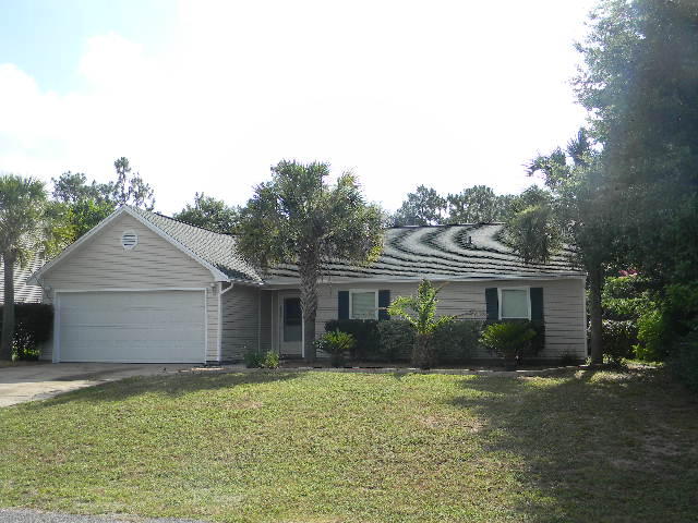 2844 Old Mill Way Crestview, FL 32539 - Photo 2 of 49 a front view of house with yard and green space
