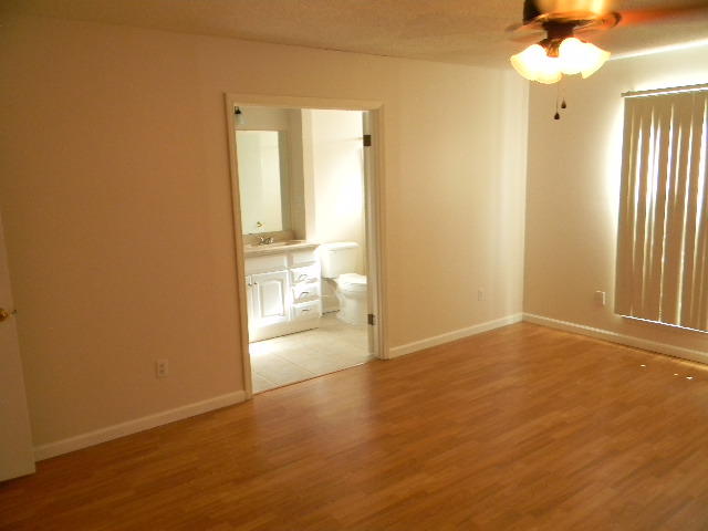 2844 Old Mill Way Crestview, FL 32539 - Photo 22 of 49 a view of empty room with wooden floor