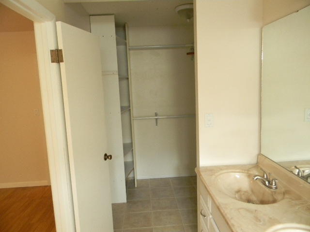 2844 Old Mill Way Crestview, FL 32539 - Photo 28 of 49 a bathroom with a granite countertop sink and a mirror