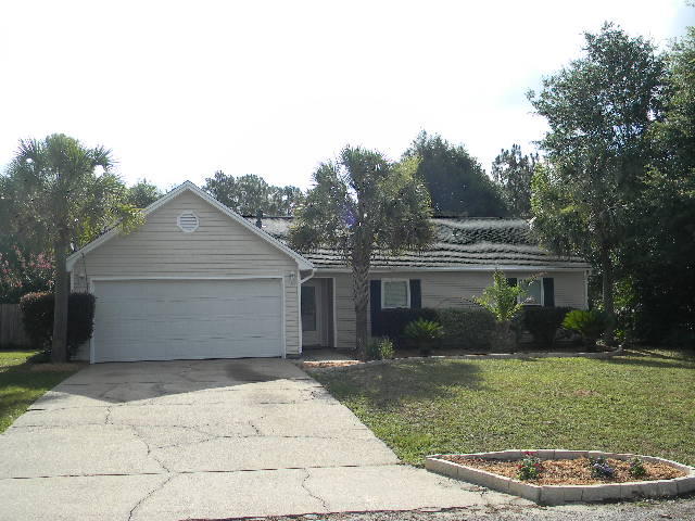2844 Old Mill Way Crestview, FL 32539 - Photo 4 of 49 front view of a house and a yard