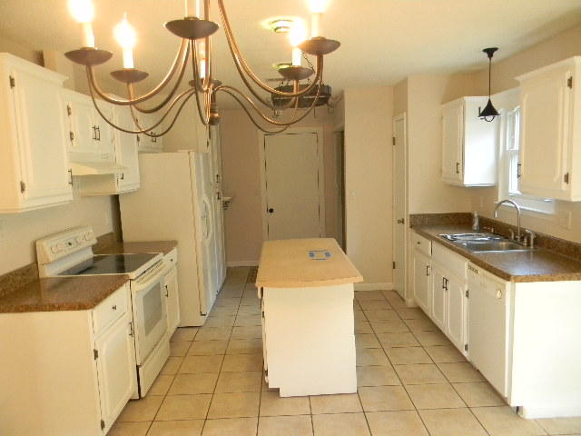 2844 Old Mill Way Crestview, FL 32539 - Photo 34 of 49 a spacious bathroom with a granite countertop sink a mirror and a bathtub