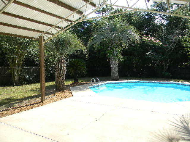 2844 Old Mill Way Crestview, FL 32539 - Photo 45 of 49 a backyard of a house with lots of green space
