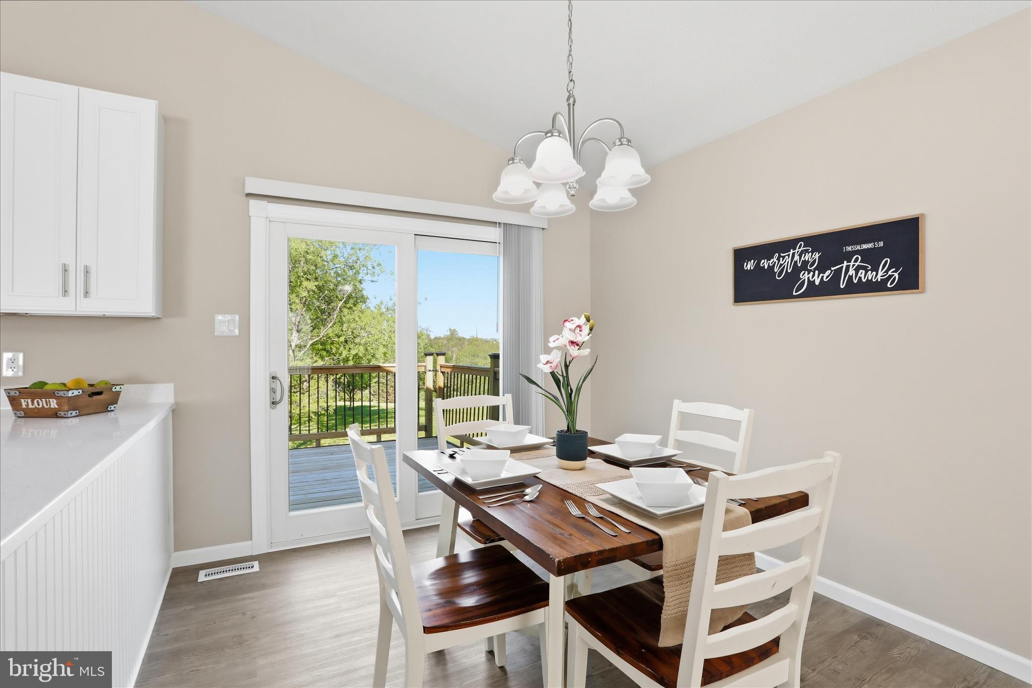 174 Open Field Lane Falling Waters, WV 25419 - Photo 15 of 61 Upper level dining area w/ slider to rear deck