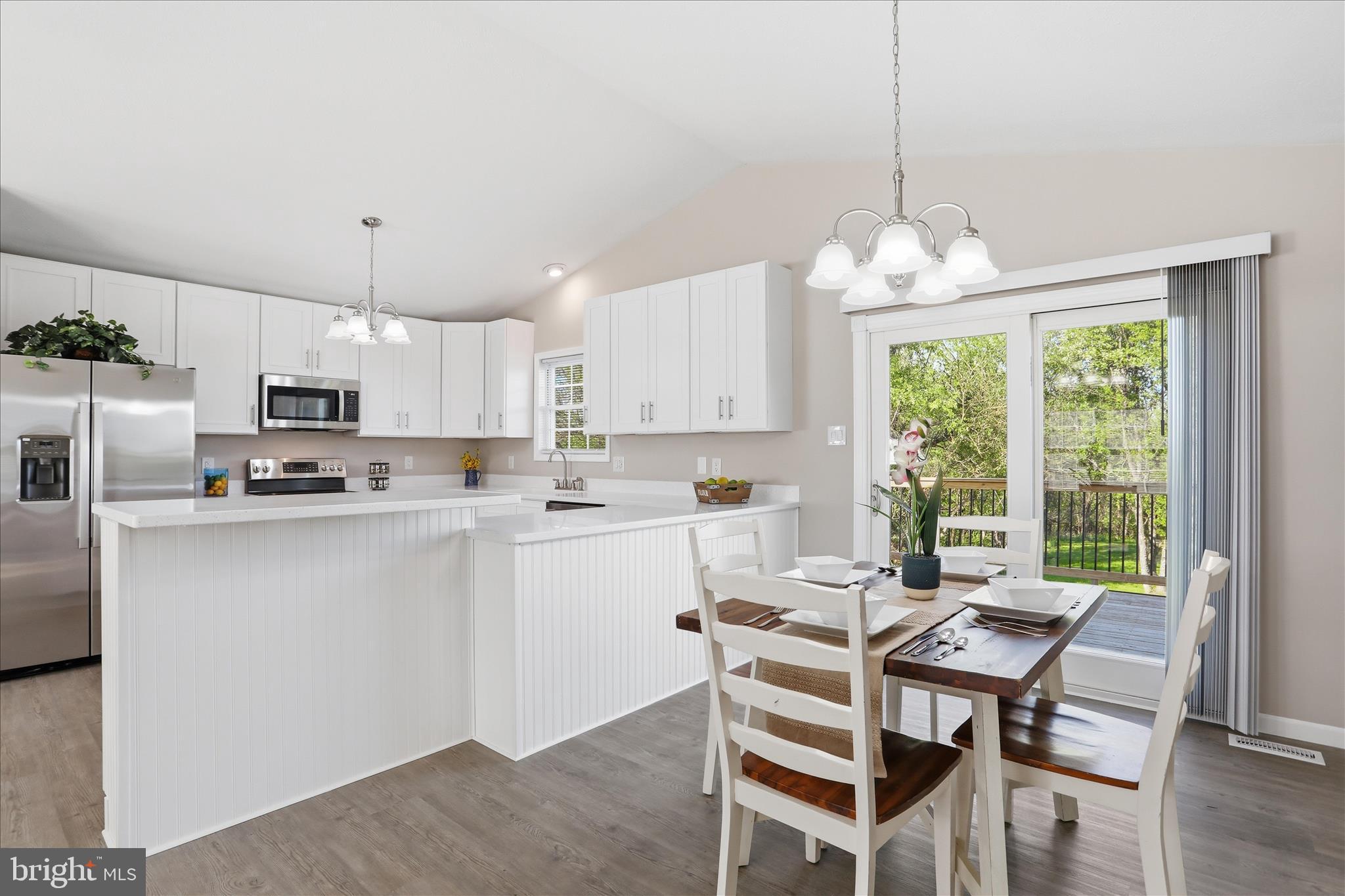 174 Open Field Lane Falling Waters, WV 25419 - Photo 16 of 61 Bar overhang with room for stools