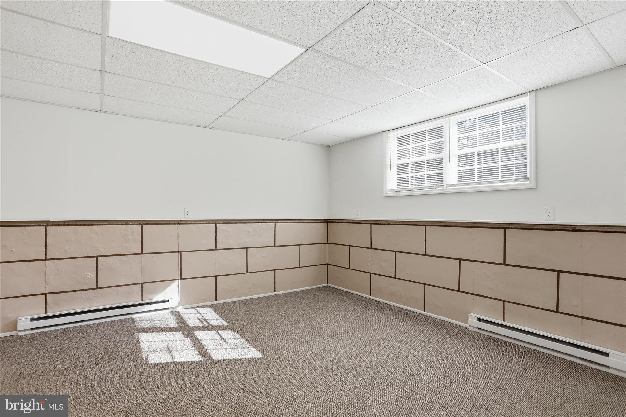 174 Open Field Lane Falling Waters, WV 25419 - Photo 31 of 61 Lower level family room