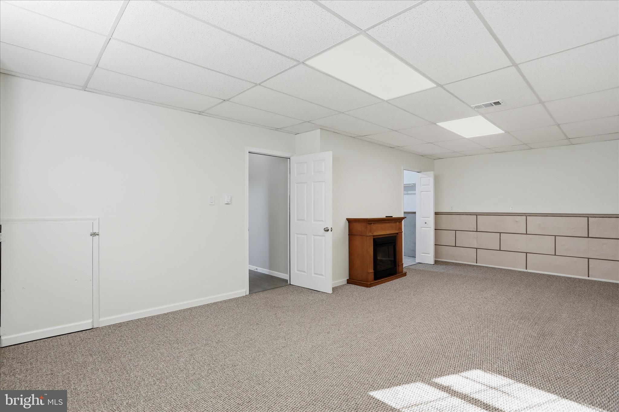 174 Open Field Lane Falling Waters, WV 25419 - Photo 32 of 61 Lower level family room