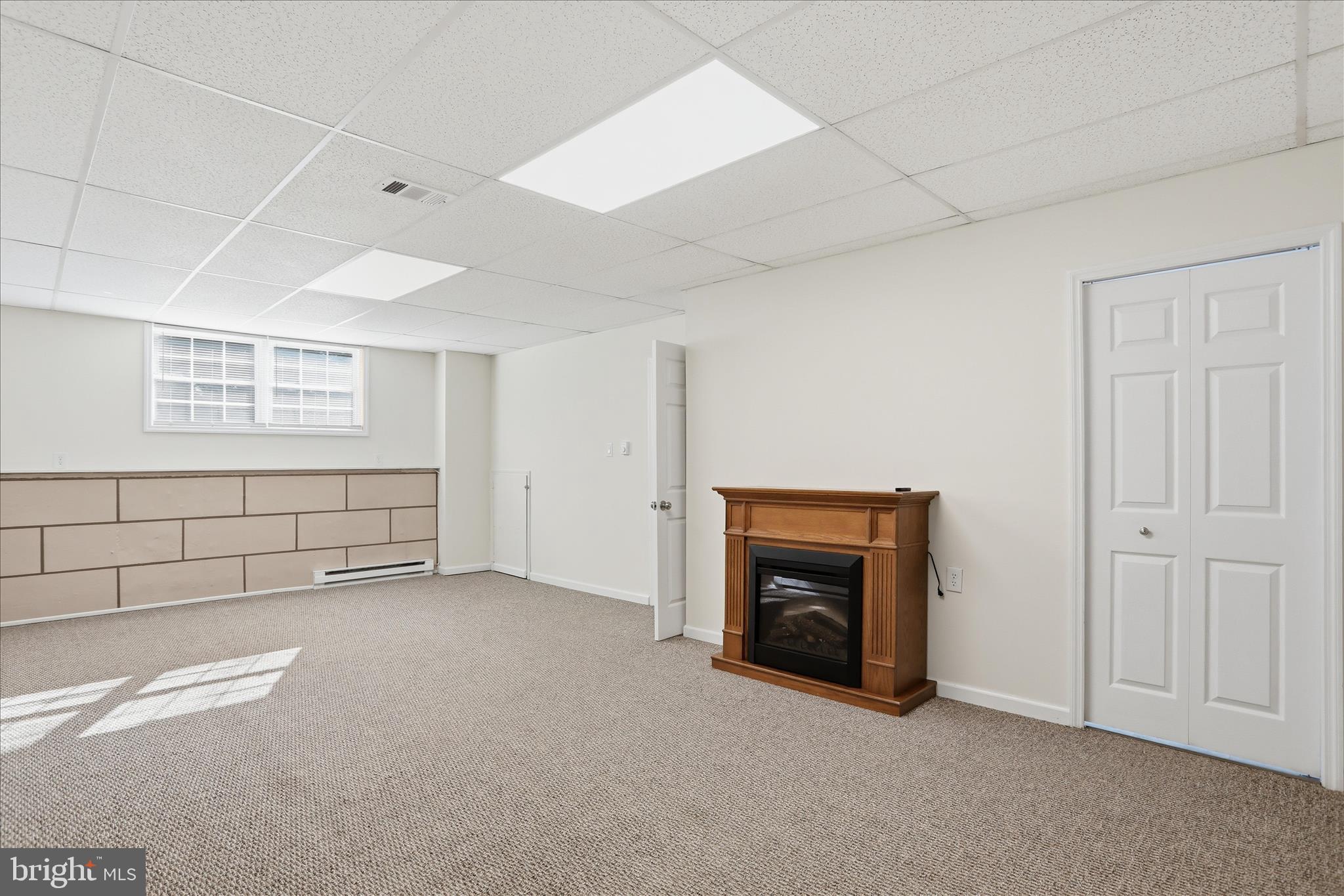 174 Open Field Lane Falling Waters, WV 25419 - Photo 33 of 61 Lower level family room
