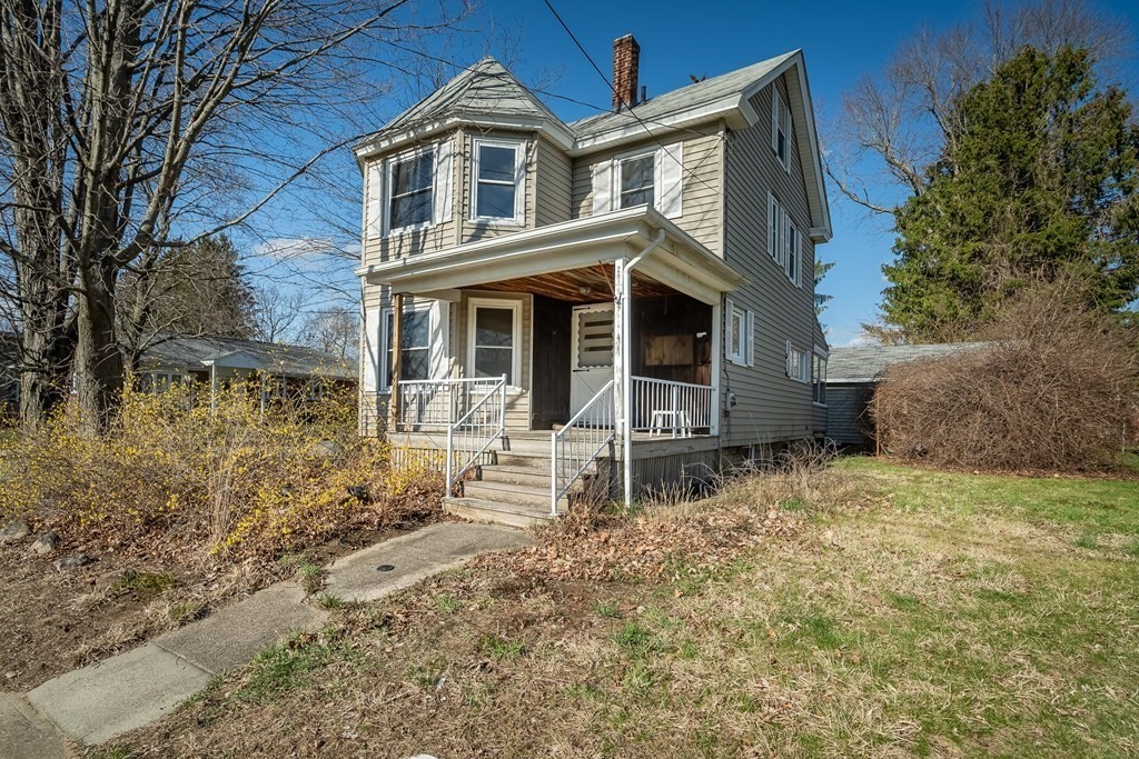 2049 Pleasant Street Three Rivers, MA 01080 - Photo 1 of 19 a front view of a house with a yard