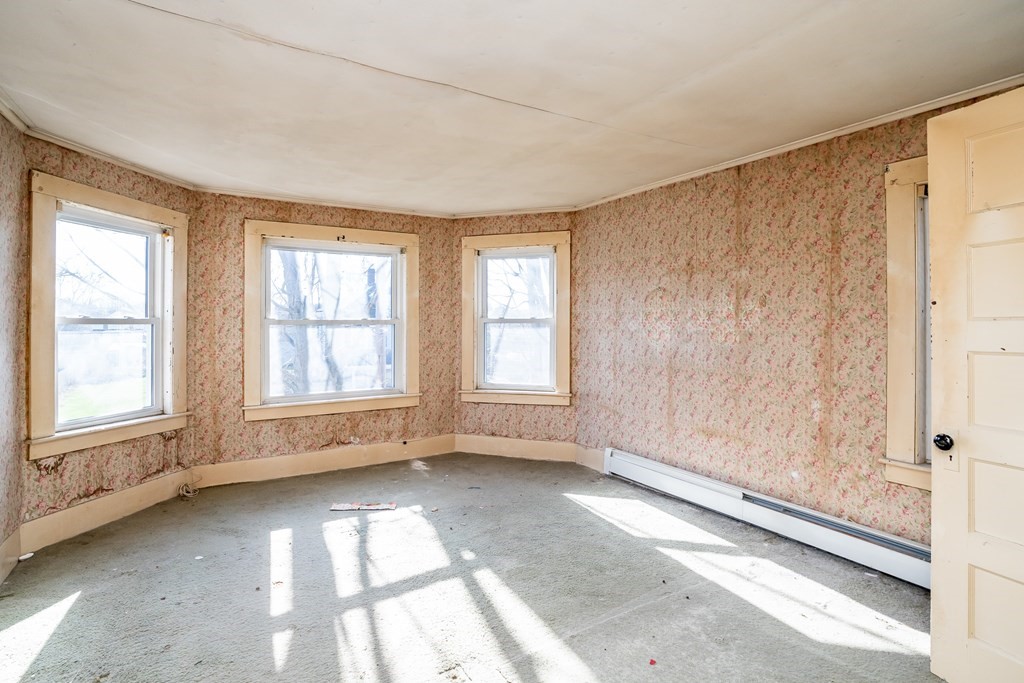 2049 Pleasant Street Three Rivers, MA 01080 - Photo 17 of 19 a view of an empty room with a window