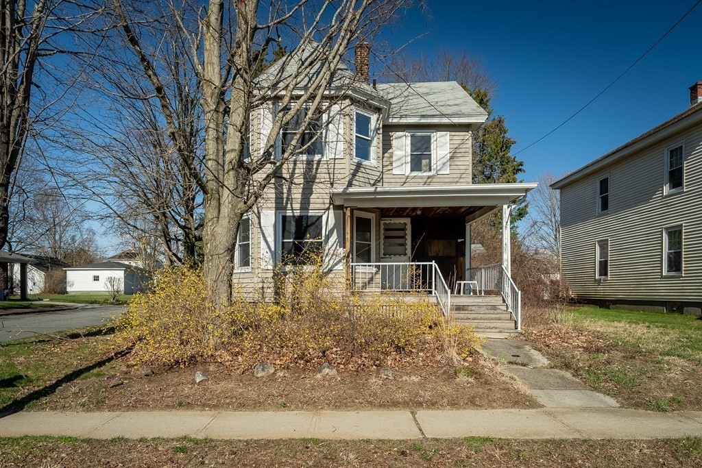 2049 Pleasant Street Three Rivers, MA 01080 - Photo 2 of 19 a front view of a house with garden