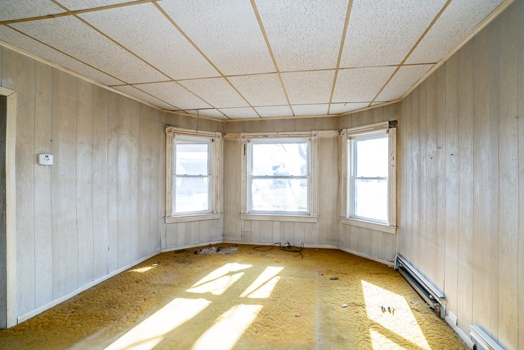 2049 Pleasant Street Three Rivers, MA 01080 - Photo 6 of 19 a view of empty room with windows