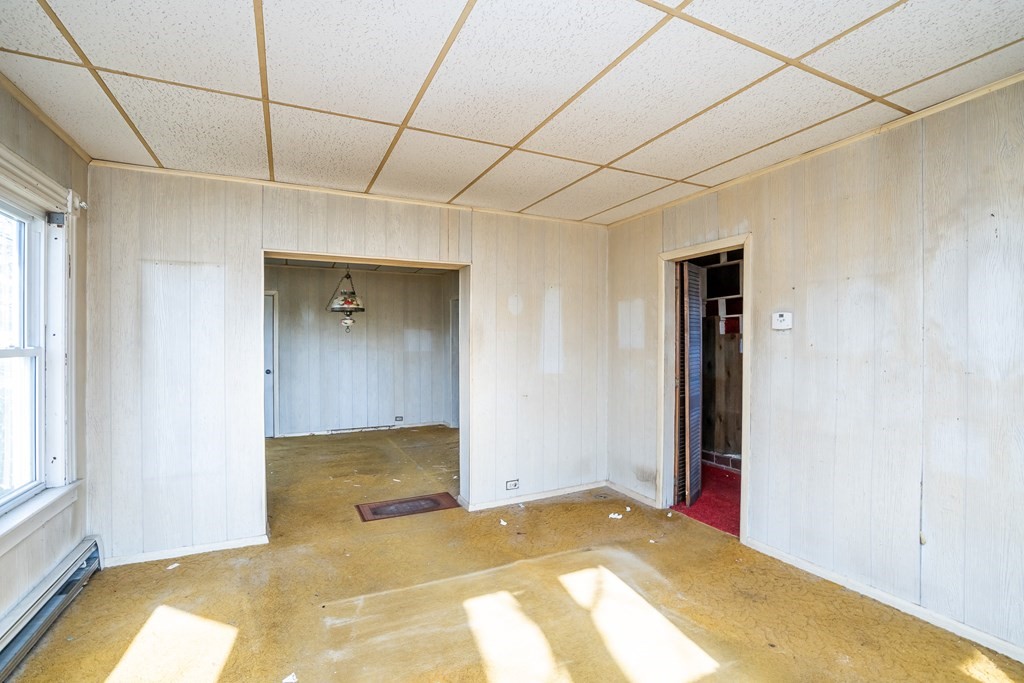 2049 Pleasant Street Three Rivers, MA 01080 - Photo 7 of 19 a view of empty room with windows