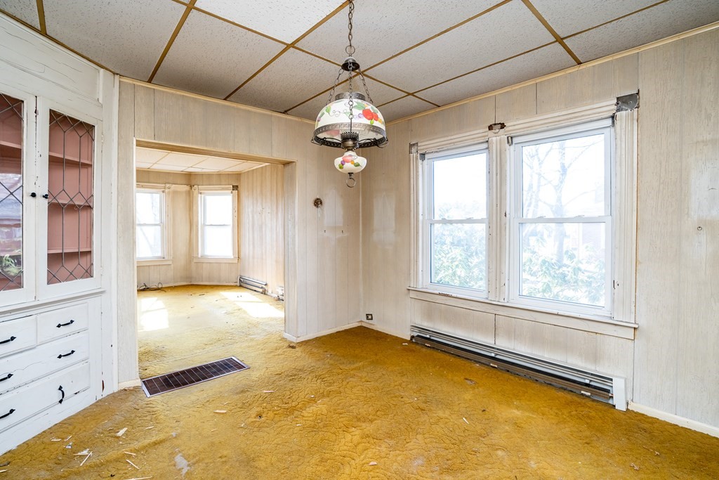 2049 Pleasant Street Three Rivers, MA 01080 - Photo 8 of 19 a view of an empty room with a window