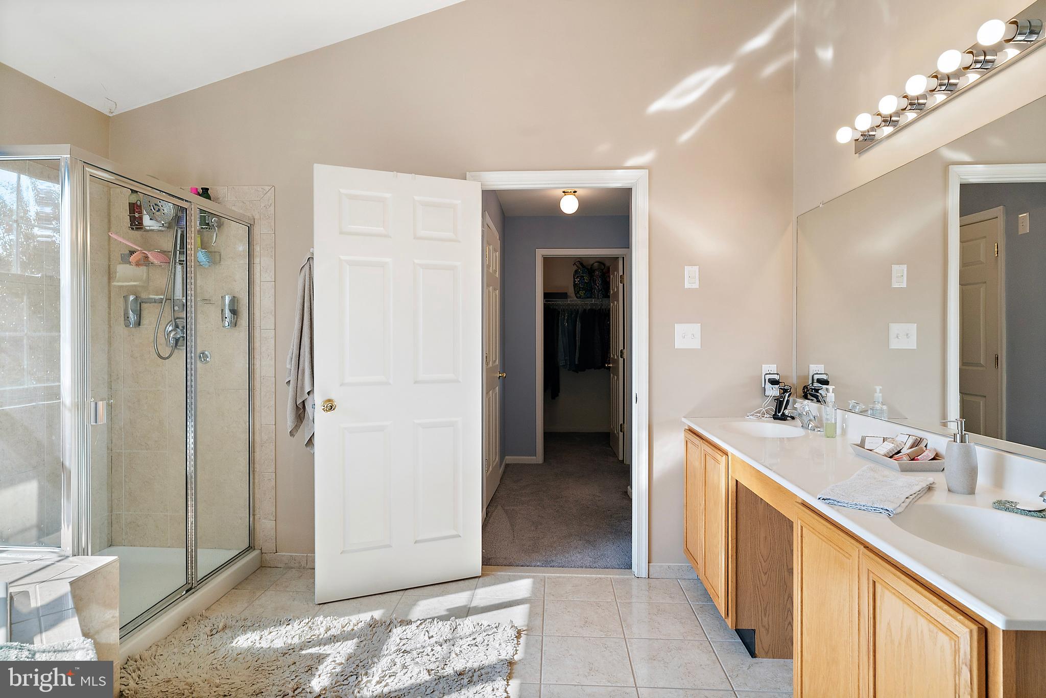 4 Midfield Street Sicklerville, NJ 08081 - Photo 23 of 40 a bathroom with a double vanity sink mirror and shower