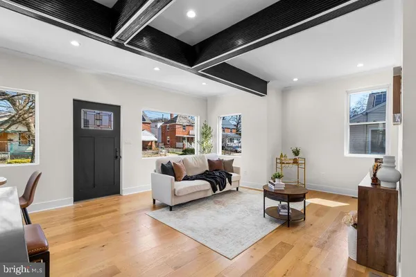 a living room with furniture and a table