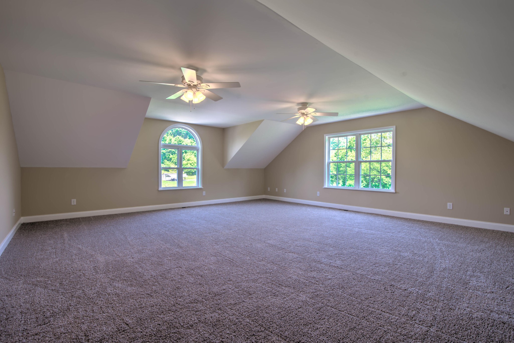 169 Lanes Bluff Road Clinton, TN 37716 - Photo 22 of 29 an empty room with a window and a ceiling fan