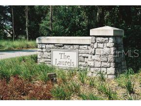 Lot 2 Southeast Lot Loop Ocala, FL 34470 - Photo 1 of 1 a view of a table and chairs under an umbrella
