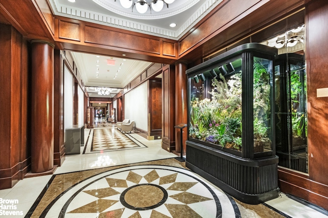 160 Central Park South, Unit 3011 Manhattan, NY 10019 - Photo 6 of 7 a view of a living room and a balcony