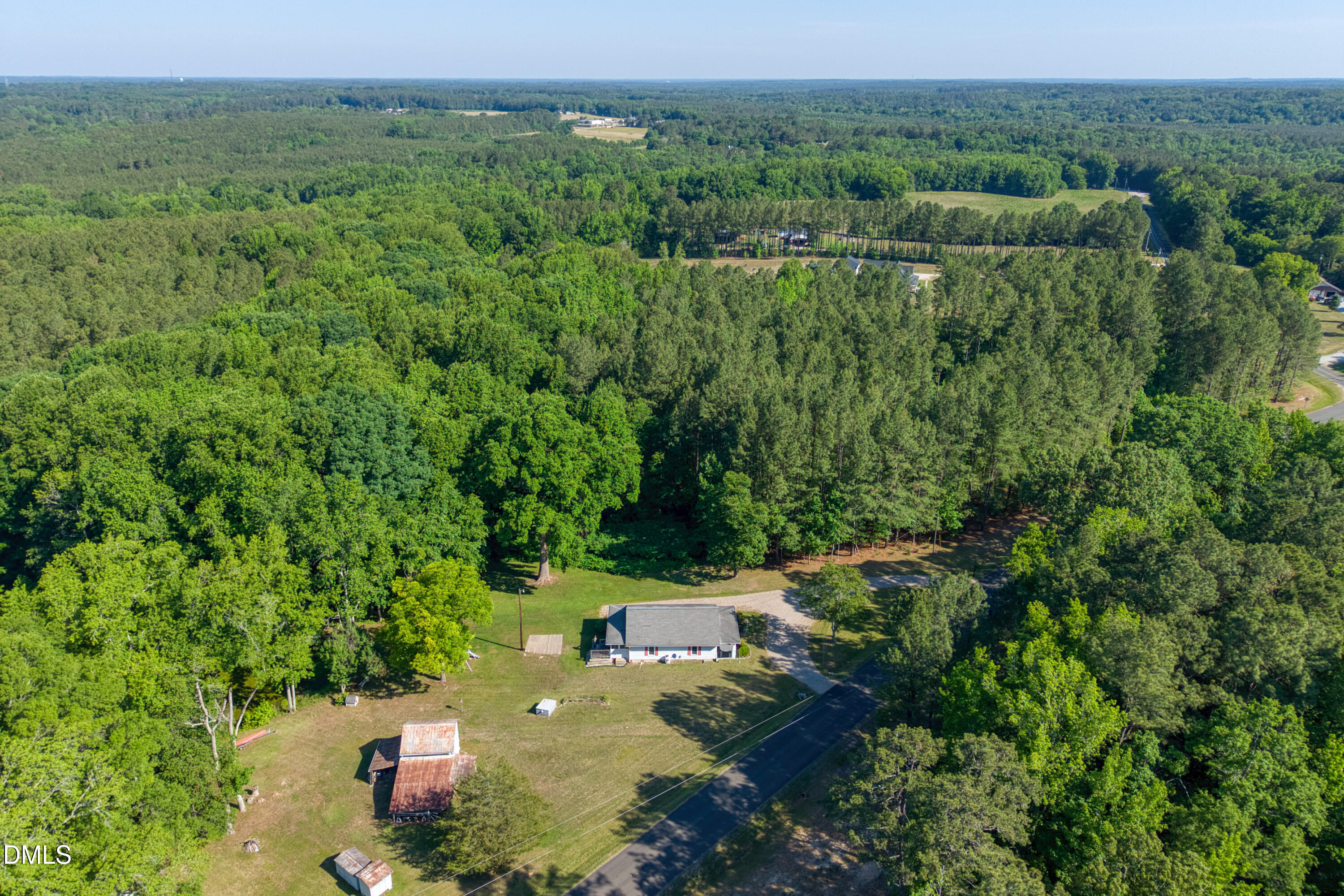 50 Robert Sledge Road Spring Hope, NC 27882 - Photo 46 of 50 a view of a forest with a street