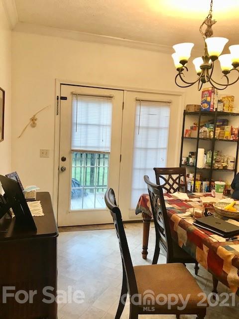 352 Pamela Road York, SC 29745 - Photo 12 of 21 a view of a dining room with furniture and a chandelier