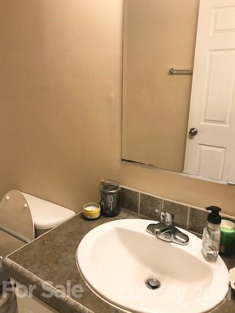 352 Pamela Road York, SC 29745 - Photo 6 of 21 a bathroom with a sink and a mirror