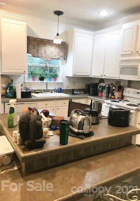 352 Pamela Road York, SC 29745 - Photo 7 of 21 a kitchen with stainless steel appliances granite countertop a sink a stove a counter space and cabinets