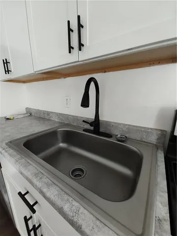 a close view of sink and tap