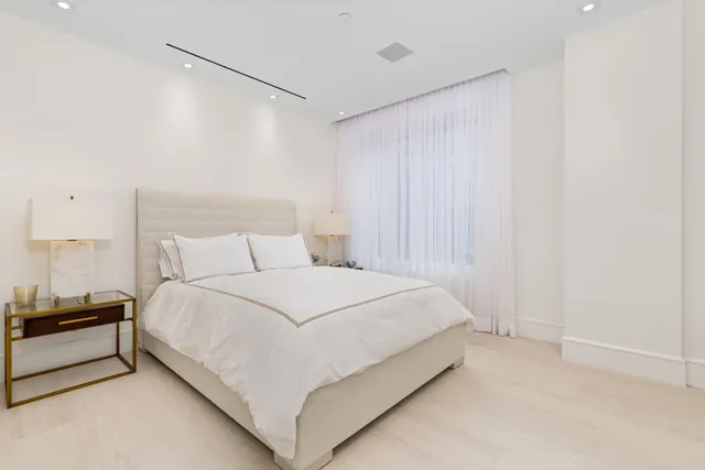 a view of swimming pool with outdoor seating and plants