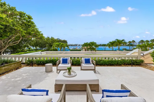 a view of a dining room with furniture and window