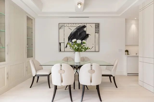 a bedroom with a bed and a mirror