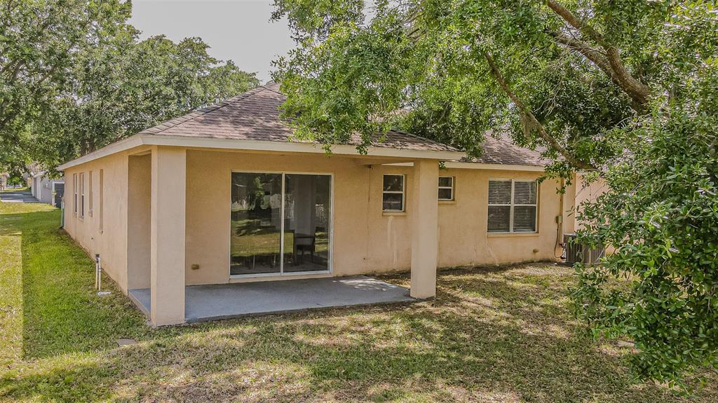 13016 Terrace Brook Place Temple Terrace, FL 33637 - Photo 18 of 27 a house with trees in front of it