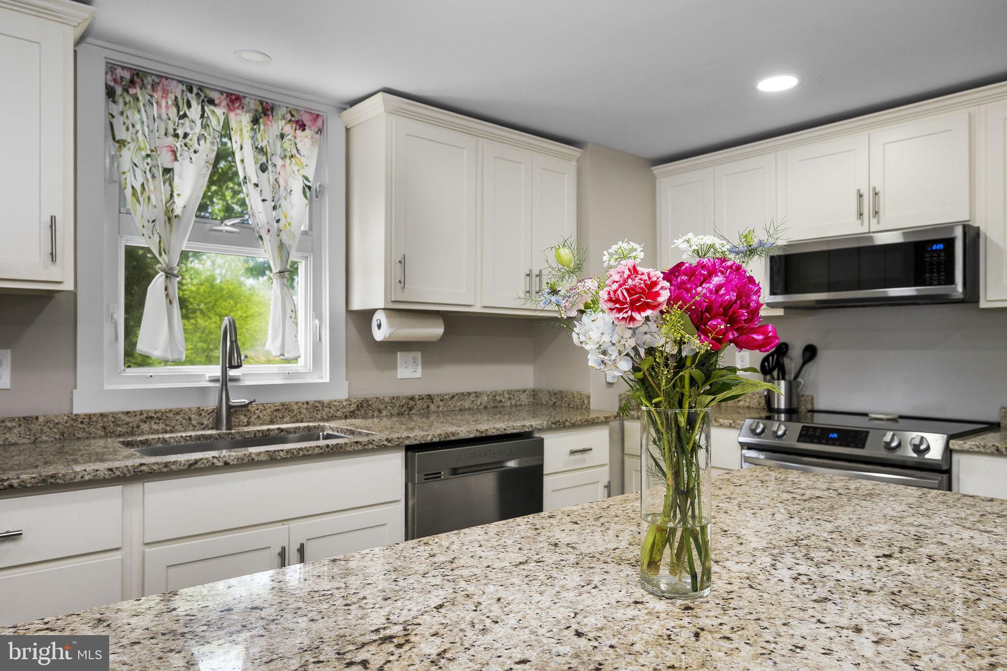 111 Garfield Road Leesport, PA 19533 - Photo 17 of 46 Bright kitchen with floral accents.