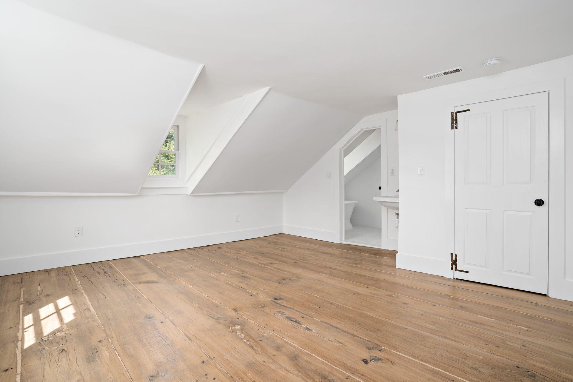 129 Davenport Ridge Road Stamford, CT 06903 - Photo 12 of 43 a view of an empty room and wooden floor