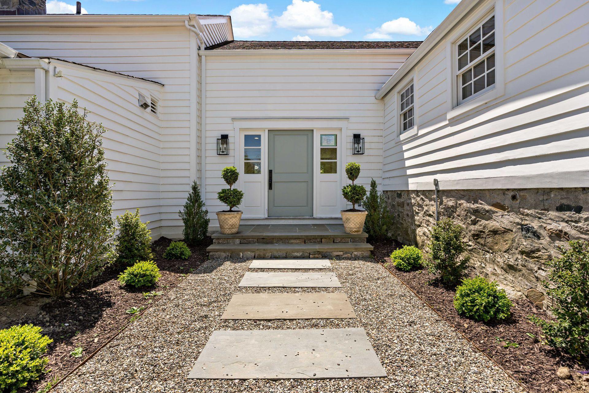 129 Davenport Ridge Road Stamford, CT 06903 - Photo 2 of 43 a front view of a house