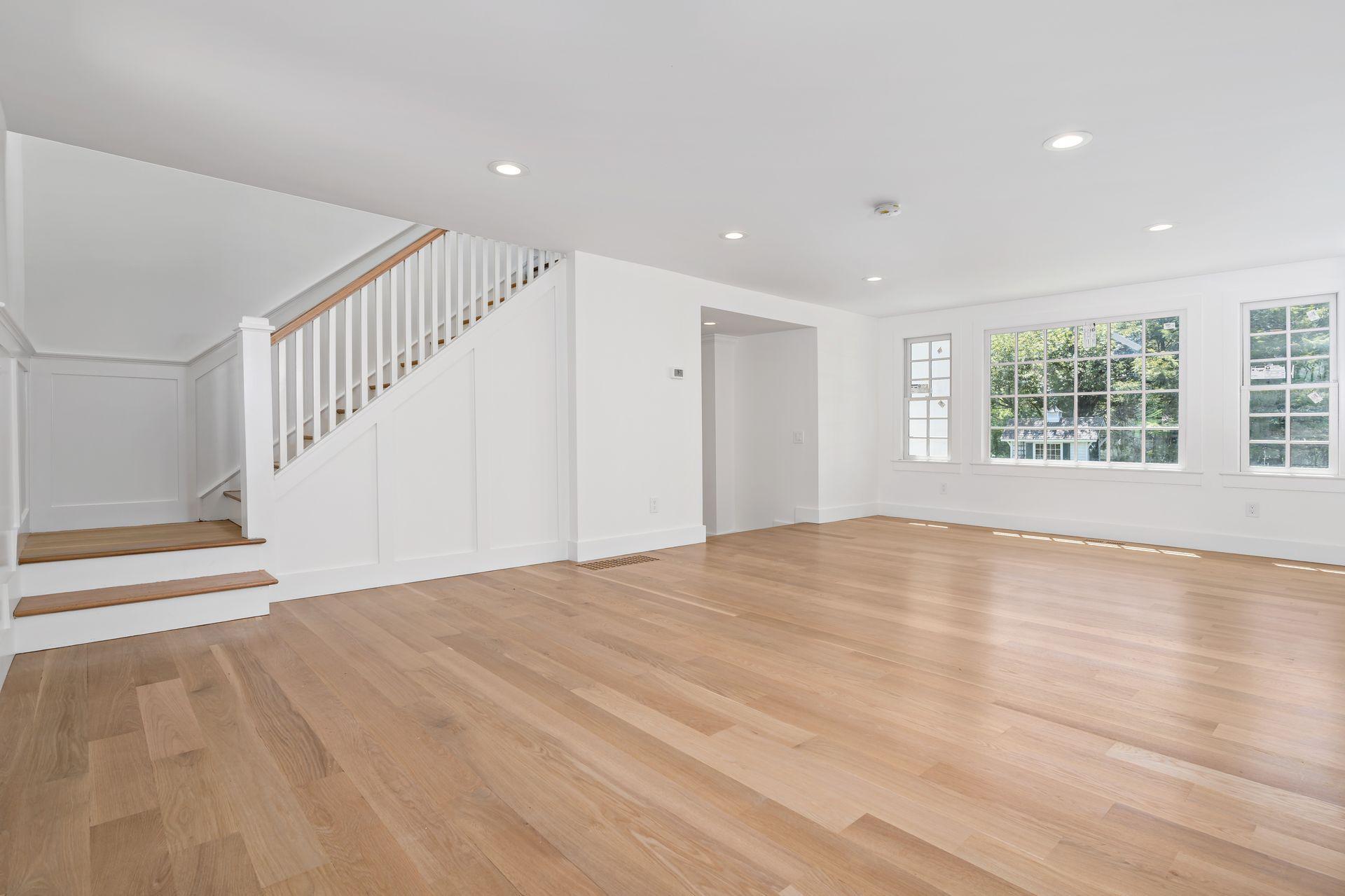 129 Davenport Ridge Road Stamford, CT 06903 - Photo 25 of 43 a view of an empty room with wooden floor and a window