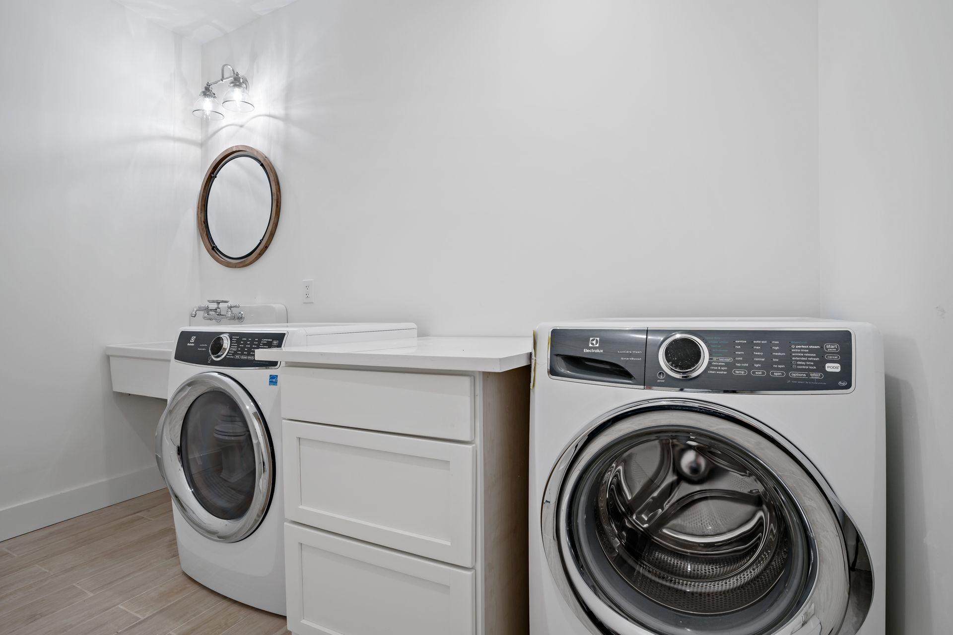 129 Davenport Ridge Road Stamford, CT 06903 - Photo 39 of 43 a utility room with dryer and washer